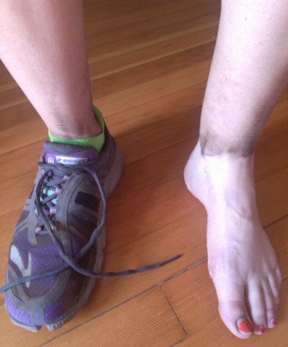 The joys of running on trail: no shin-splints, less knee pain, and impressive filth. Poor purple shoes. 